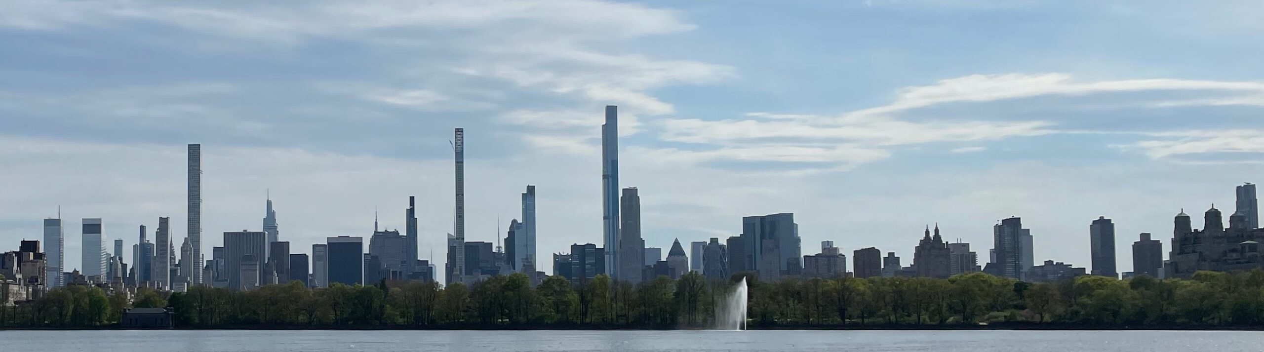Photo of the Manhattan skyline as seen from the reservoir in Central Park.
